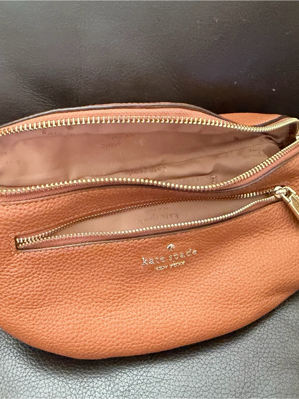 kate spade tan pebbled leather crescent crossbody with gold hardware
